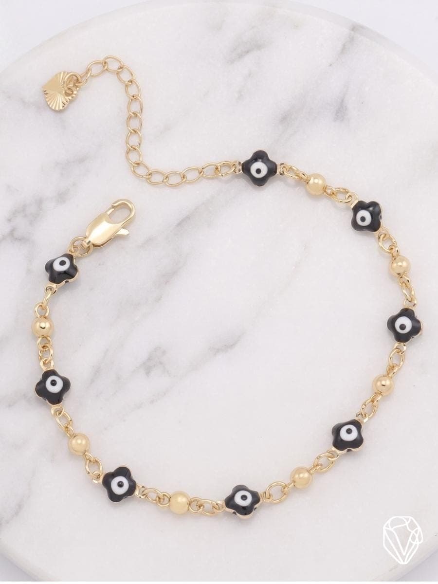 Pulsera Ojos de Suerte Negro — Oro Laminado Americano | Varelis