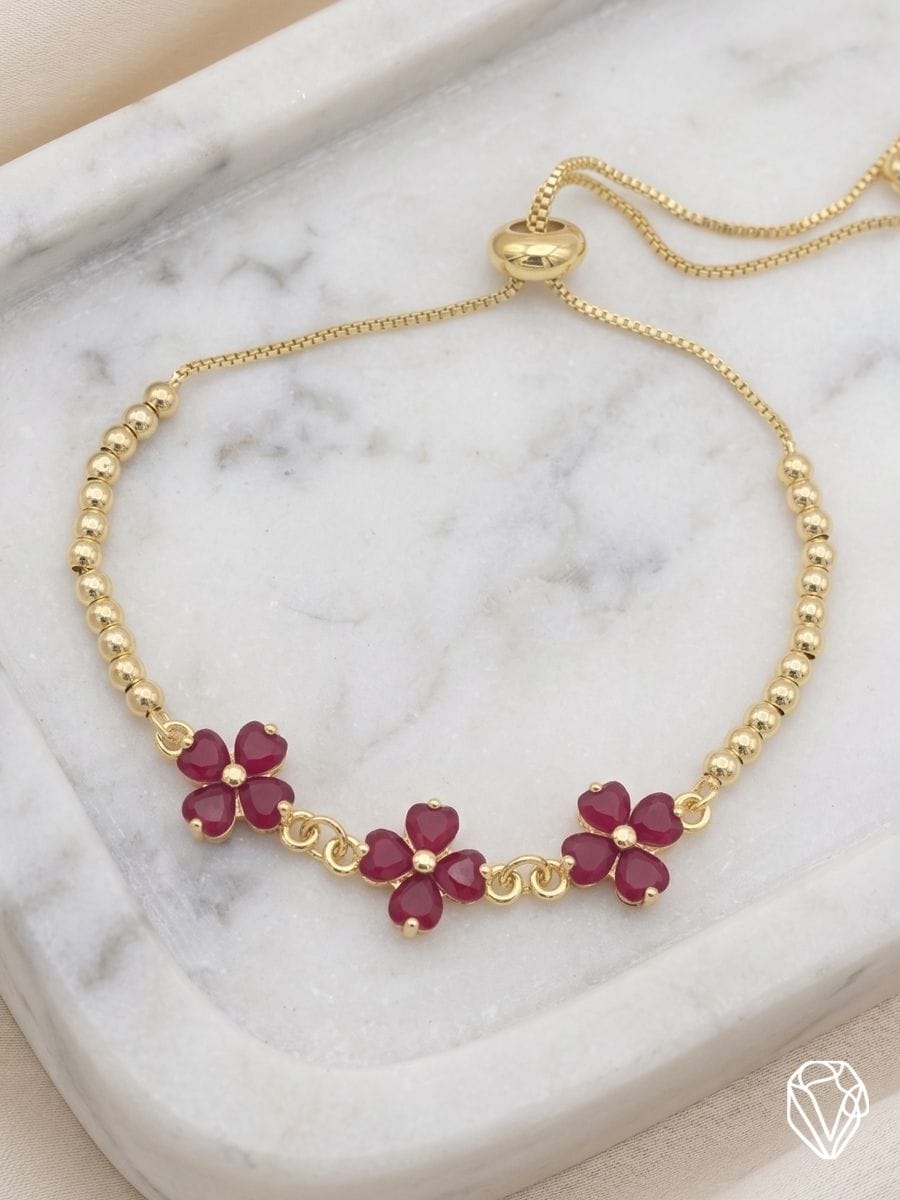 Pulsera Trébol Rojo — Oro Laminado Americano | Varelis Joyería