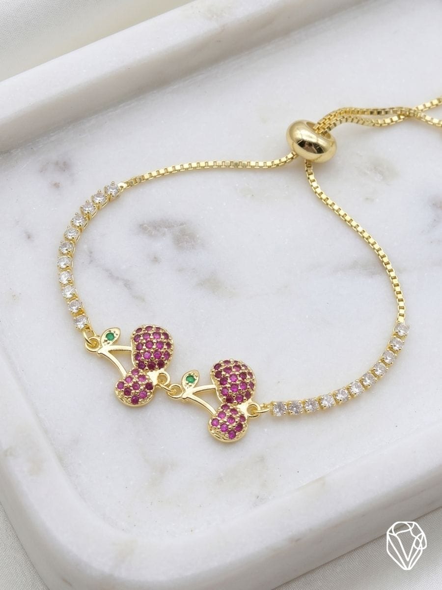 Pulsera Cerezas Rosa — Oro Laminado Americano | Varelis Joyería