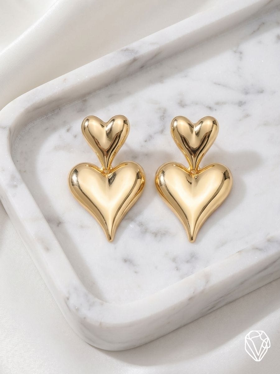 Aretes Corazón Doble — Oro Laminado Americano | Varelis Joyería