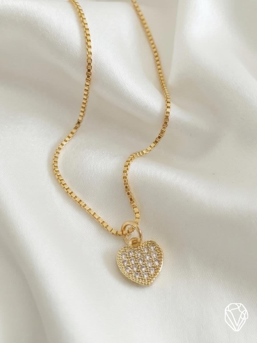 Dije Corazón Brillo — Oro Laminado Americano | Varelis