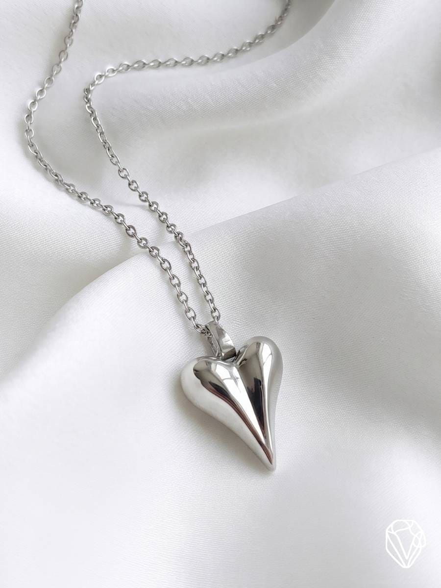 Dije Corazón Plateado — Oro Laminado Americano | Varelis